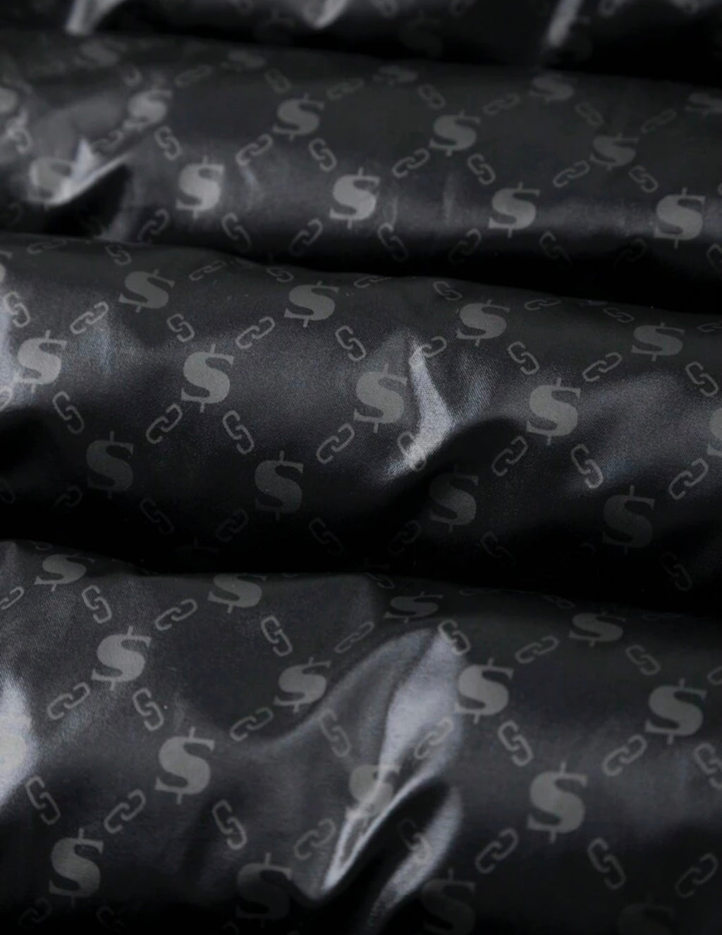 Gewatteerde grafische print heren winterjas zwart twee manieren te gebruiken