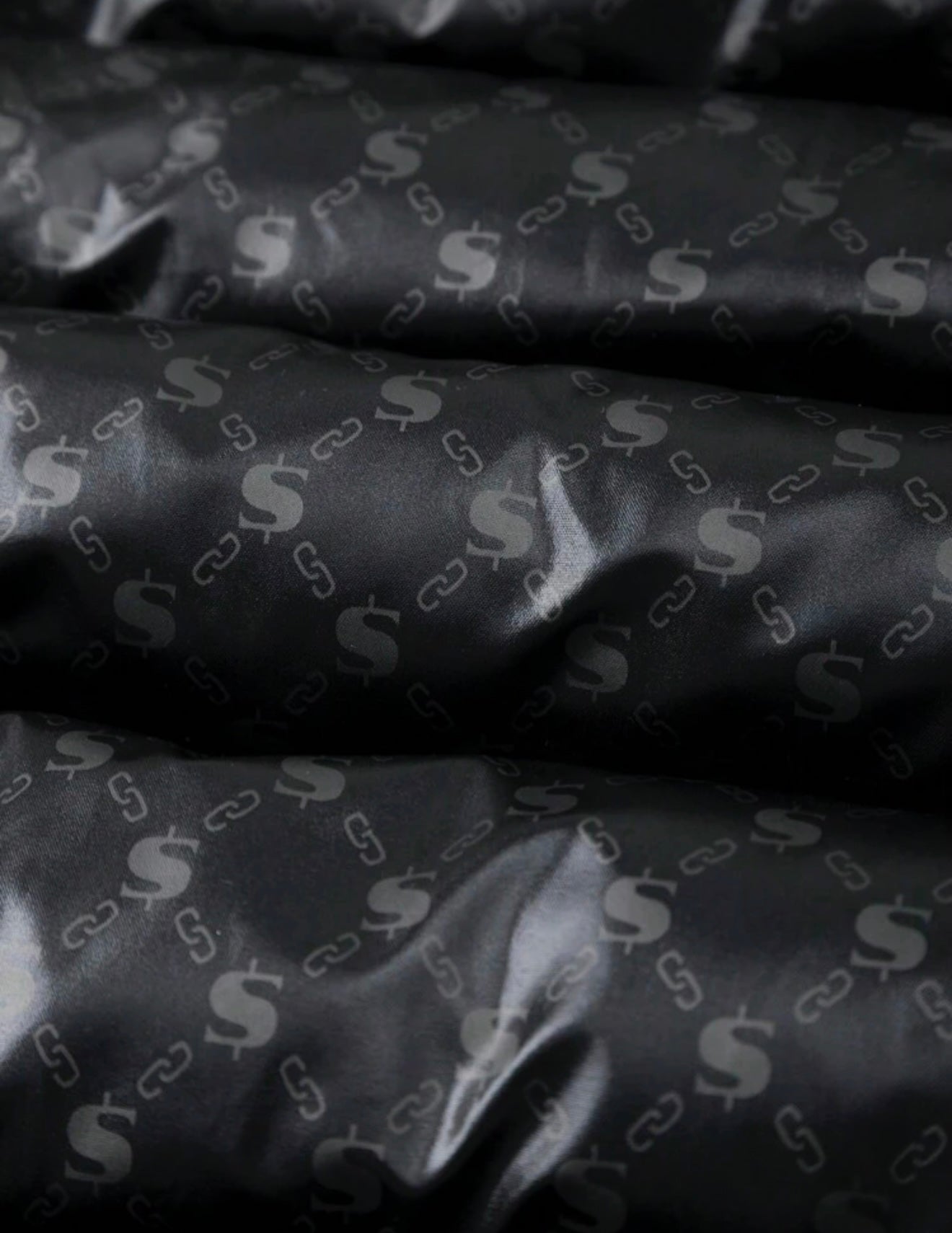 Gewatteerde grafische print heren winterjas zwart twee manieren te gebruiken