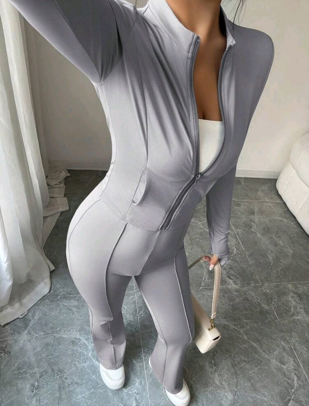 Women’s Toght- fitting zip-up cropped top with mandarin collar and flared pants 2 pieces set