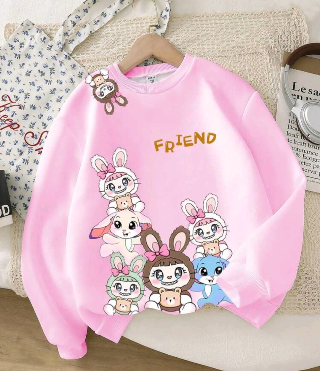 Young girl cute cartoon floppy ear blue rabbit print sweatshirt